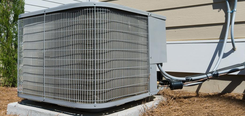 Large outdoor air conditioning unit on cement platforms